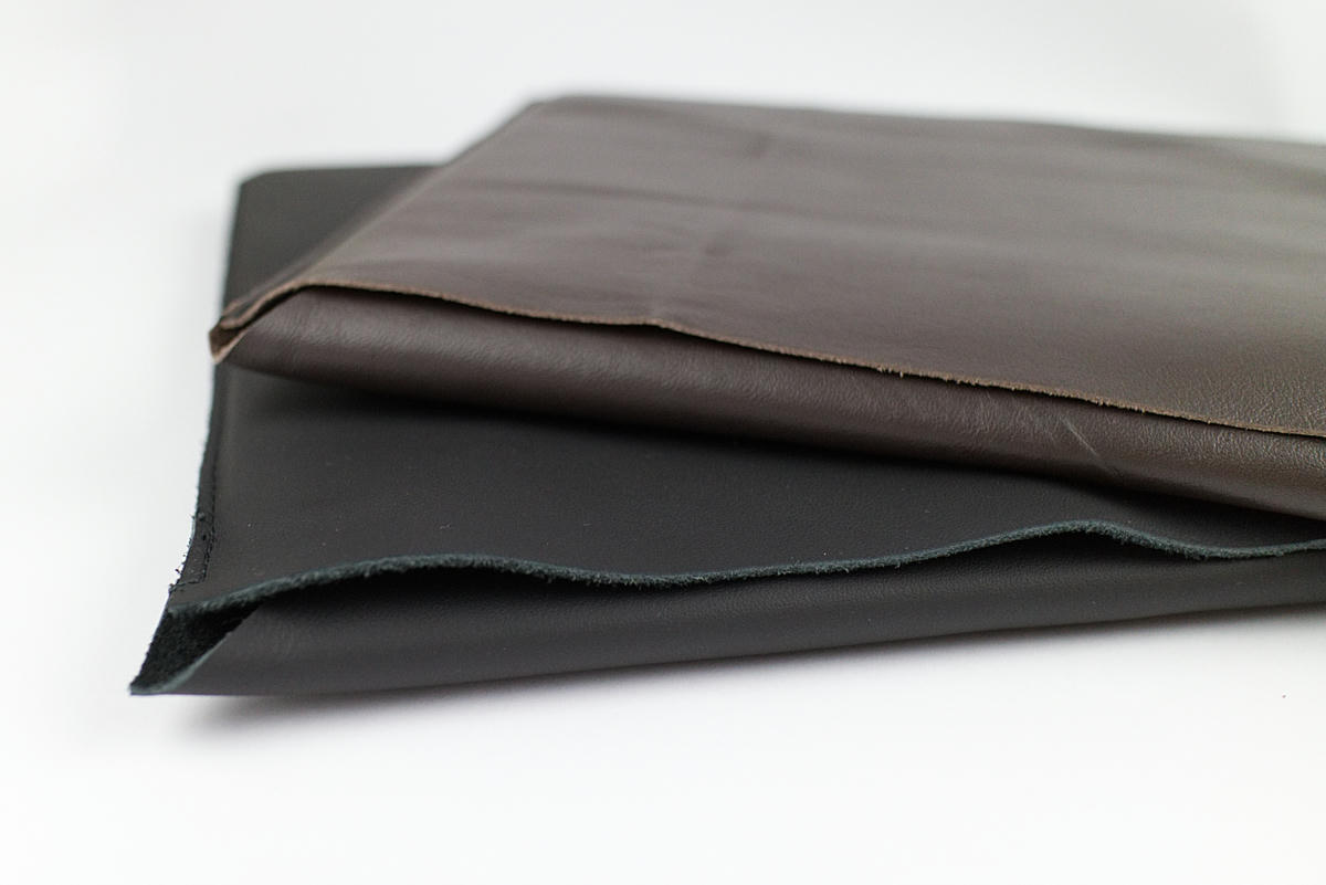 2 leather laptop sleeves